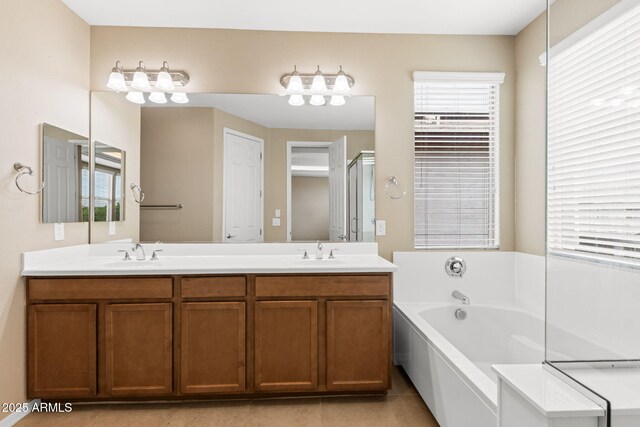 3072 E Appaloosa Rd, Gilbert, AZ 85296 - full bathroom with double vanity, a bath, tile patterned flooring, and a sink
