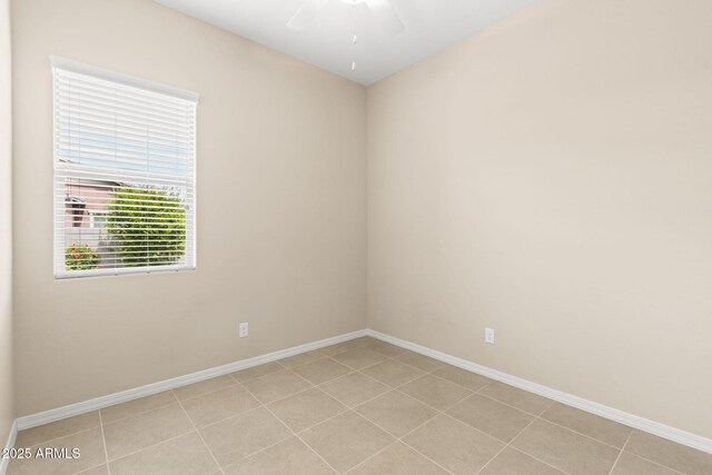 3072 E Appaloosa Rd, Gilbert, AZ 85296 - spare room with baseboards, ceiling fan, and light tile patterned floors