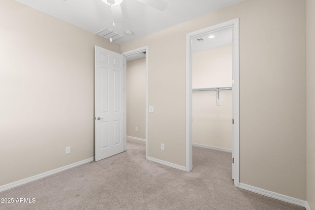 3072 E Appaloosa Rd, Gilbert, AZ 85296 - unfurnished bedroom with a closet, a walk in closet, ceiling fan, carpet, and baseboards