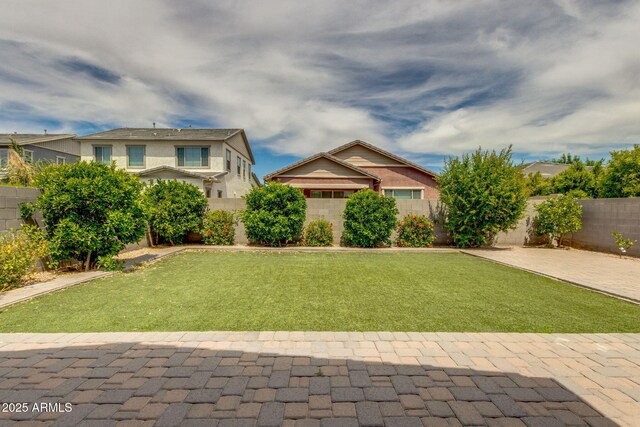 3072 E Appaloosa Rd, Gilbert, AZ 85296 - view of front of property with a front lawn, a patio area, a fenced backyard, and stucco siding