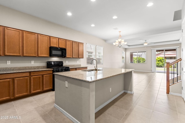 3072 E Appaloosa Rd, Gilbert, AZ 85296 - kitchen with brown cabinets, a sink, and black appliances