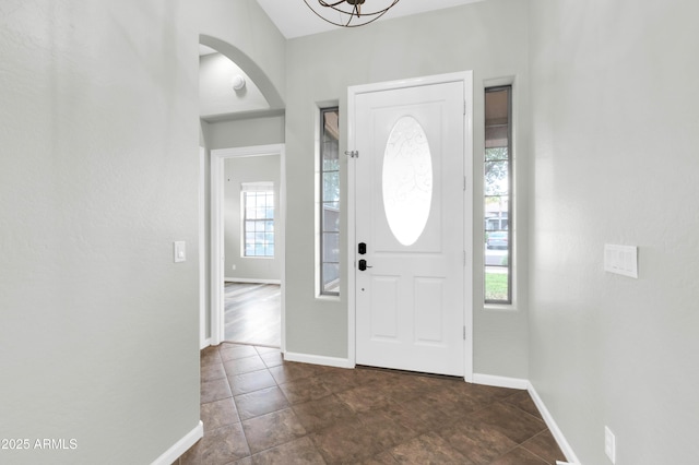 18544 E Caledonia Dr, Queen Creek, AZ 85142 - entrance foyer with arched walkways and baseboards