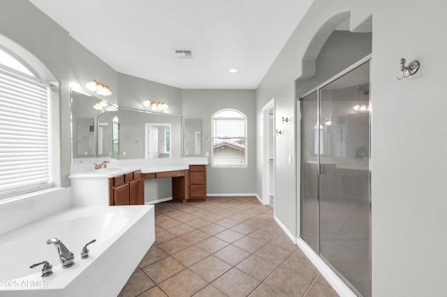18544 E Caledonia Dr, Queen Creek, AZ 85142 - bathroom featuring vanity, visible vents, a stall shower, tile patterned flooring, and a garden tub