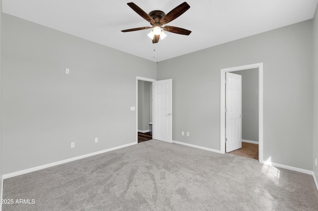 18544 E Caledonia Dr, Queen Creek, AZ 85142 - unfurnished bedroom with ceiling fan, baseboards, and carpet floors