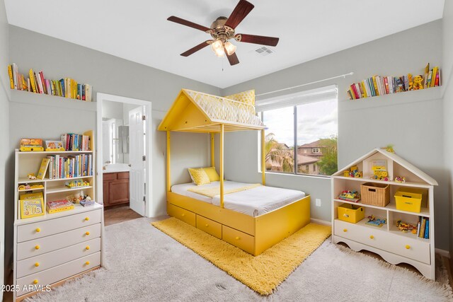 18544 E Caledonia Dr, Queen Creek, AZ 85142 - carpeted bedroom featuring a closet, visible vents, ensuite bath, and ceiling fan