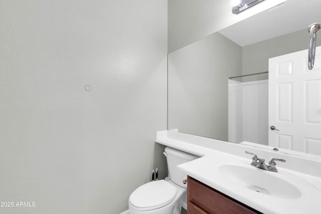 18544 E Caledonia Dr, Queen Creek, AZ 85142 - bathroom featuring toilet, vanity, and a shower