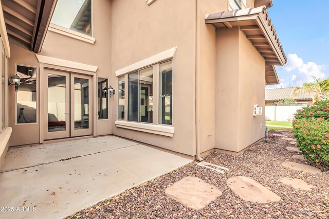 18544 E Caledonia Dr, Queen Creek, AZ 85142 - rear view of property with a patio, french doors, and stucco siding