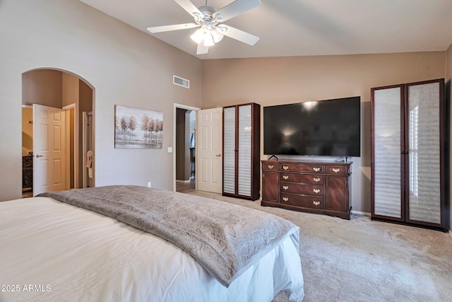 2984 N 152nd Dr, Goodyear, AZ 85395 - carpeted bedroom with arched walkways, high vaulted ceiling, and ceiling fan