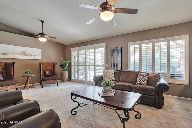2984 N 152nd Dr, Goodyear, AZ 85395 - carpeted living area with ceiling fan, plenty of natural light, and lofted ceiling