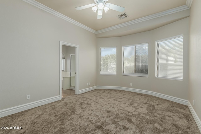 unfurnished room featuring ceiling fan, carpet floors, and ornamental molding