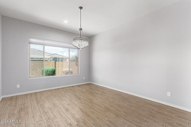 unfurnished bedroom featuring ceiling fan and wood-type flooring