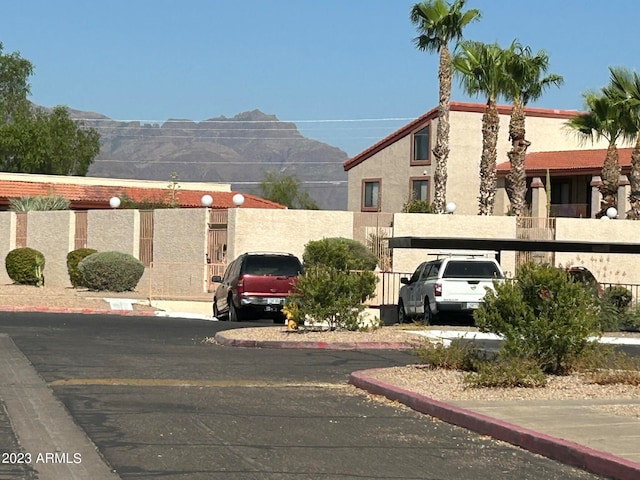 view of building exterior featuring a mountain view