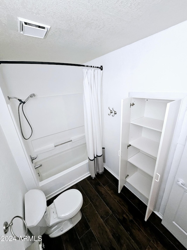 1440 N Idaho Rd Unit 2041, Apache Junction, AZ 85119 - bathroom with shower / bath combo with shower curtain, wood finished floors, and a textured ceiling