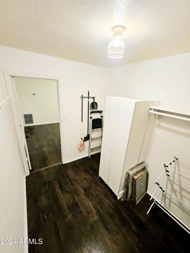 1440 N Idaho Rd Unit 2041, Apache Junction, AZ 85119 - spacious closet featuring dark wood-style floors