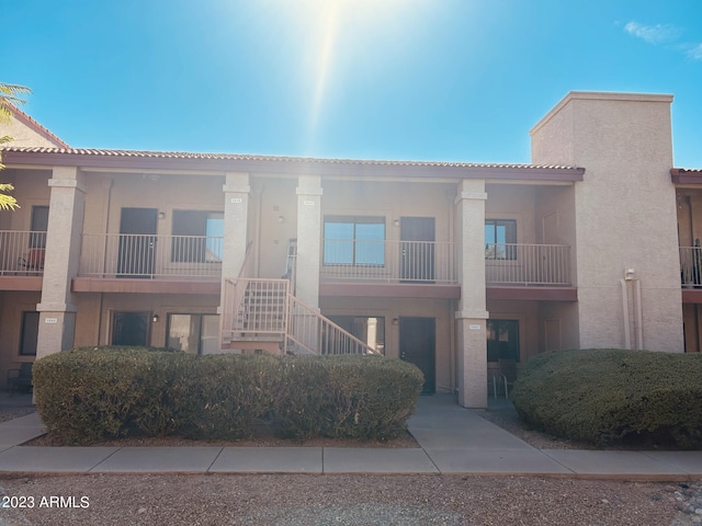 1440 N Idaho Rd Unit 2041, Apache Junction, AZ 85119 - view of building exterior with stairway