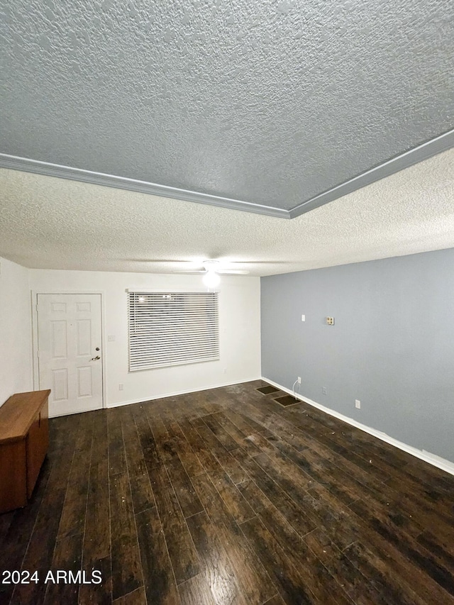 1440 N Idaho Rd Unit 2041, Apache Junction, AZ 85119 - unfurnished living room with wood-type flooring and a textured ceiling