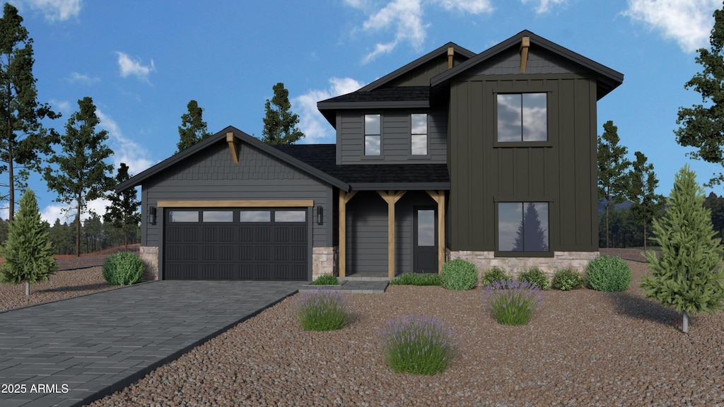 craftsman inspired home with stone siding, decorative driveway, board and batten siding, and an attached garage