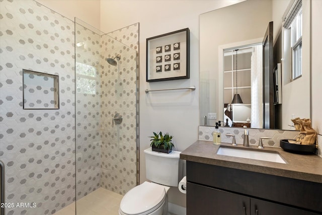 full bath with walk in shower, toilet, and vanity