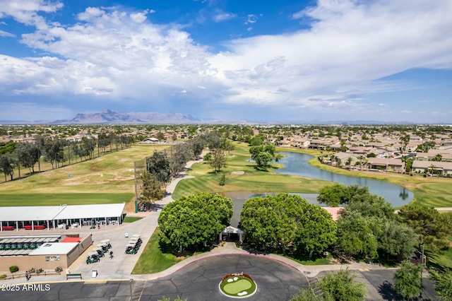 aerial view with view of golf course and a water view