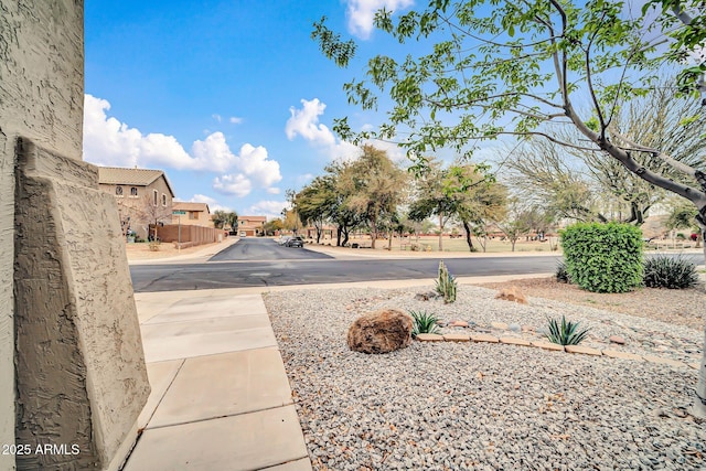 view of yard featuring a residential view