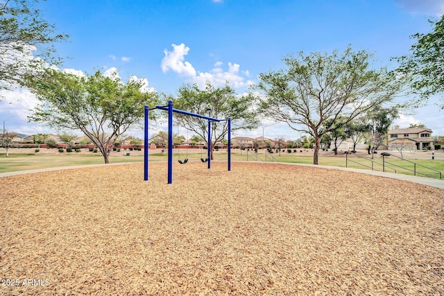 view of property's community featuring playground community