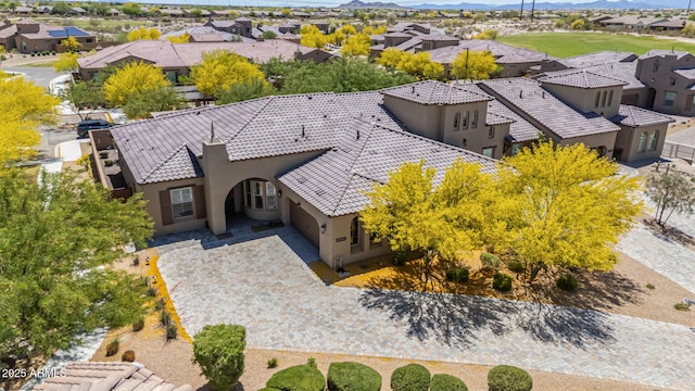 bird's eye view featuring a residential view and a mountain view