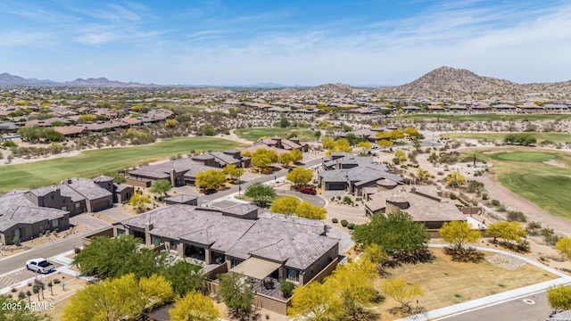 birds eye view of property featuring a residential view, a mountain view, and golf course view