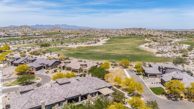 birds eye view of property with a residential view, a mountain view, and view of golf course