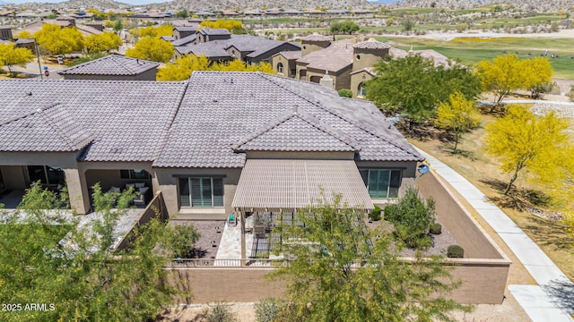 bird's eye view featuring a mountain view and a residential view