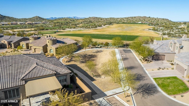 drone / aerial view with a mountain view and a residential view