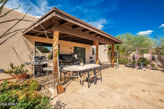 view of patio / terrace featuring a grill