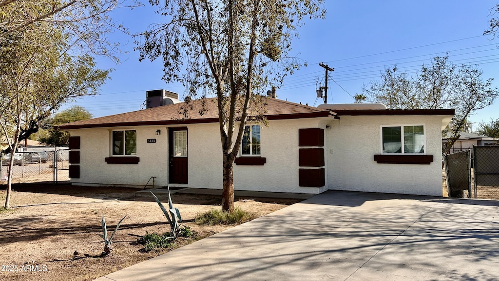 ranch-style home with a patio area