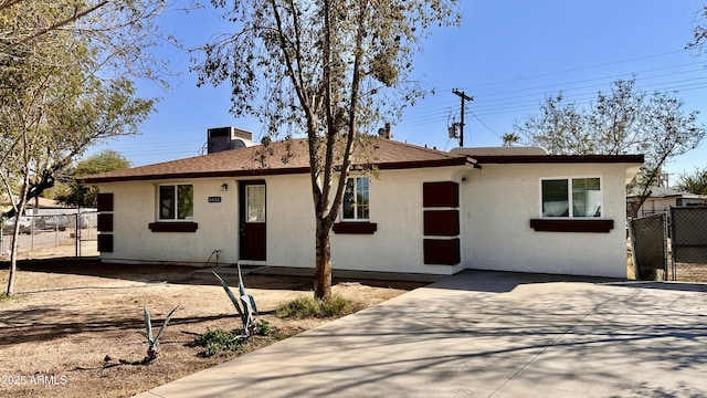 ranch-style home with a patio area