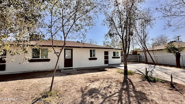 rear view of property with a patio