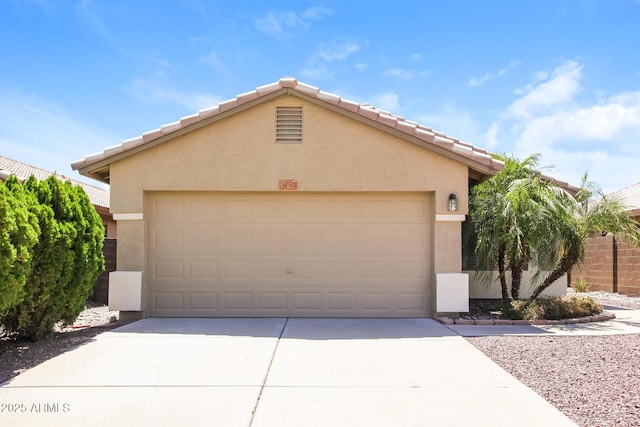 3750 S Conestoga Rd, Apache Junction, AZ 85119 - view of front of house featuring stucco siding, concrete driveway, and an attached garage