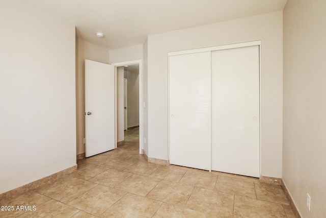 3750 S Conestoga Rd, Apache Junction, AZ 85119 - unfurnished bedroom with a closet and baseboards