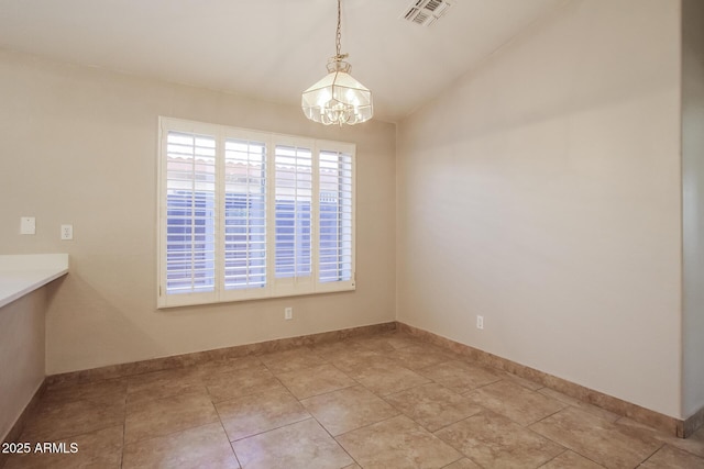 3750 S Conestoga Rd, Apache Junction, AZ 85119 - empty room featuring a chandelier and vaulted ceiling