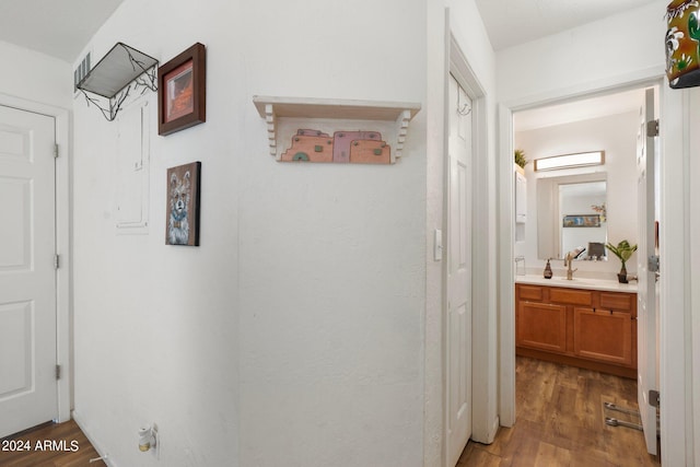 hallway with wood-type flooring