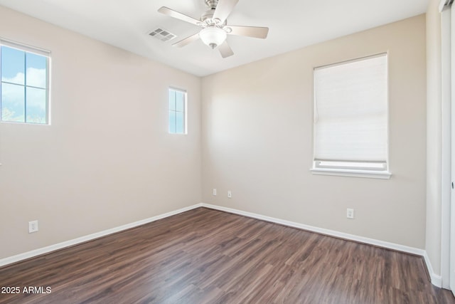 9305 E Canyon View Rd, Scottsdale, AZ 85255 - spare room with ceiling fan, wood finished floors, visible vents, and baseboards