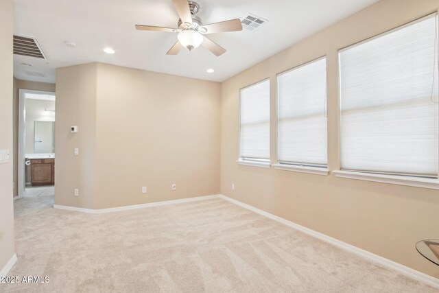 9305 E Canyon View Rd, Scottsdale, AZ 85255 - empty room featuring a ceiling fan, baseboards, visible vents, recessed lighting, and light carpet
