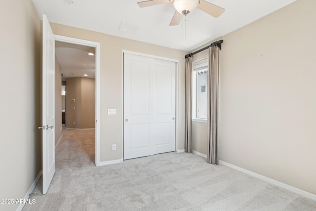 9305 E Canyon View Rd, Scottsdale, AZ 85255 - unfurnished bedroom with baseboards, ceiling fan, light colored carpet, recessed lighting, and a closet