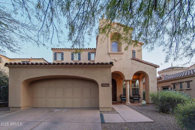 9305 E Canyon View Rd, Scottsdale, AZ 85255 - mediterranean / spanish home with stucco siding, a tile roof, concrete driveway, a garage, and a chimney