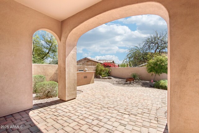 9305 E Canyon View Rd, Scottsdale, AZ 85255 - view of patio / terrace featuring an outdoor kitchen and a fenced backyard