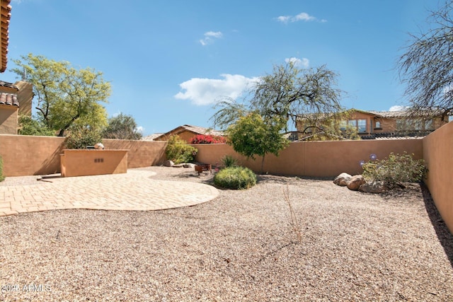 9305 E Canyon View Rd, Scottsdale, AZ 85255 - view of yard featuring a patio area and a fenced backyard
