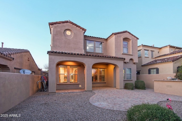 9305 E Canyon View Rd, Scottsdale, AZ 85255 - back of property featuring a tile roof, a patio area, fence, and stucco siding