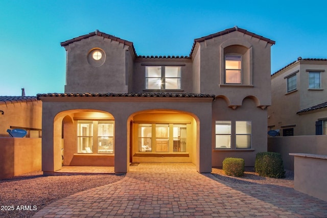 9305 E Canyon View Rd, Scottsdale, AZ 85255 - rear view of house featuring a tiled roof, fence, and stucco siding