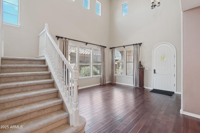 9305 E Canyon View Rd, Scottsdale, AZ 85255 - entryway with stairs, plenty of natural light, wood finished floors, and baseboards