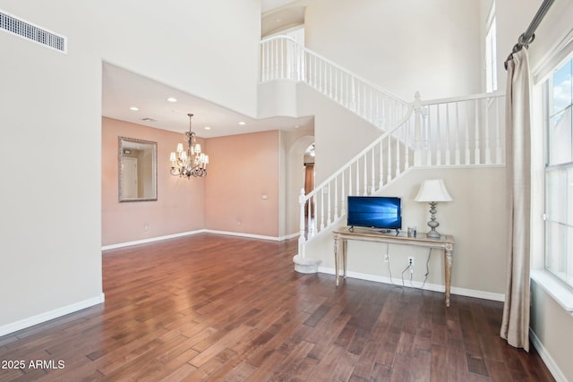 9305 E Canyon View Rd, Scottsdale, AZ 85255 - interior space featuring visible vents, baseboards, wood finished floors, and stairs