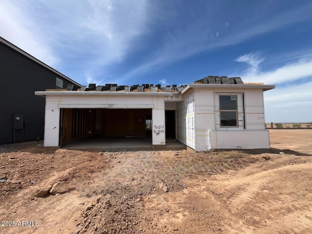 47450 W Kenner Dr, Maricopa, AZ 85139 - view of front of home featuring a garage, brick siding, and driveway