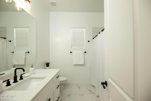 full bathroom with visible vents, baseboards, toilet, marble finish floor, and vanity